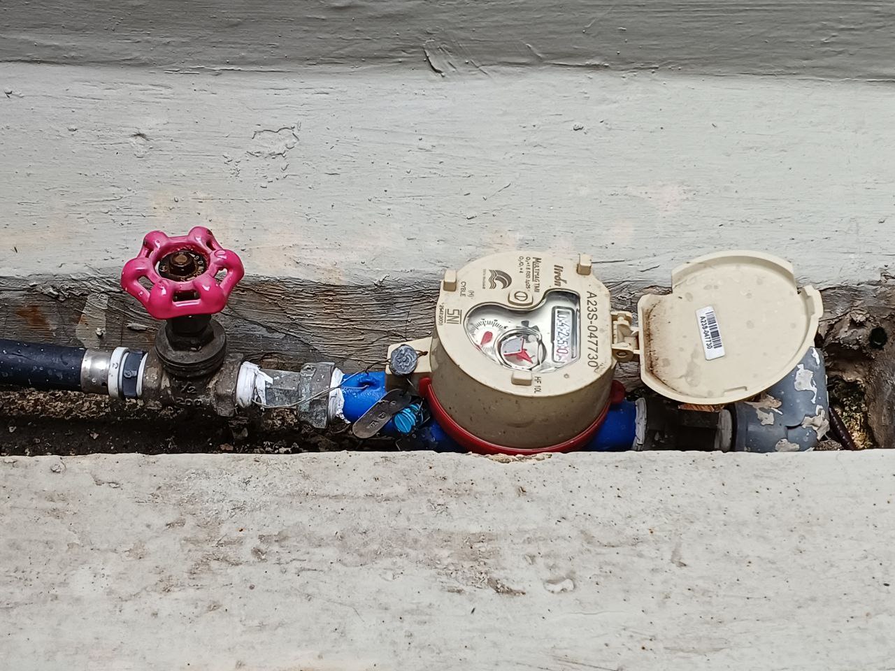 Water pipe and valve in a wall
